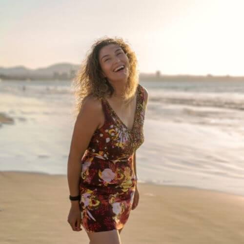 Woman smiling on the beach